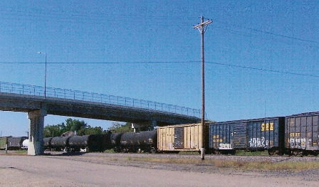 Train under overpass